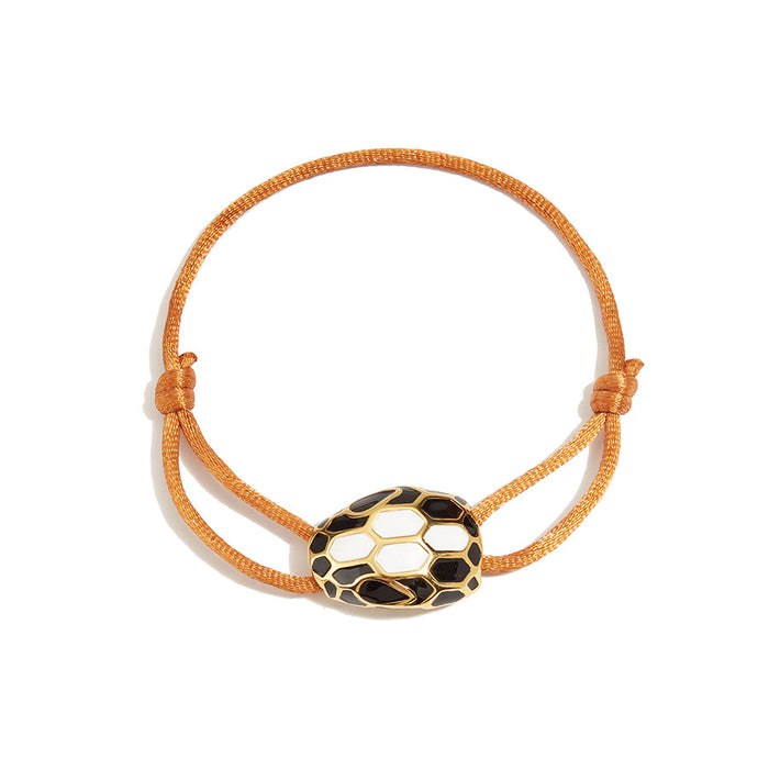 Bob Snake Cobra Rope Bracelet in Black & White Enamel And Gold Tone — real photo 5